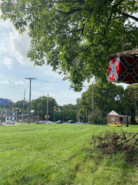 A confederate flag was left hanging from a tree on R.H. Boyd Publishing Corporation's property