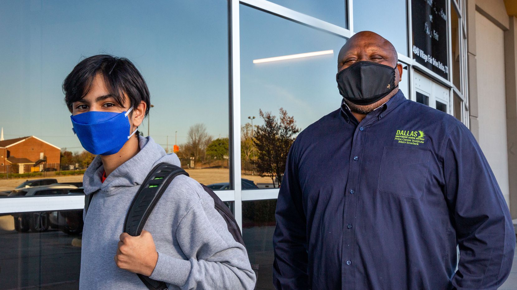 Plumbing instructor Merv Scurlark (right) and freshman aviation student Israel Olivares pose for a photo at the Career Institutes South campus in Dallas on Nov. 20, 2020. This fall marked the opening of three DISD Career Institutes -- centralized facilities designed to give students hands-on experience in industries like plumbing, cybersecurity and construction. But with the coronavirus pandemic raging, fulfilling the promise of that hands-on training became much more complicated. Scurlark said the pandemic has affected the number of students that would normally enroll in his classes, but that he’s hopeful the interest would return post-pandemic. “It’s good, honest work that provides a lot of opportunity after high school,” he said. (Lynda M. González/Staff Photographer)