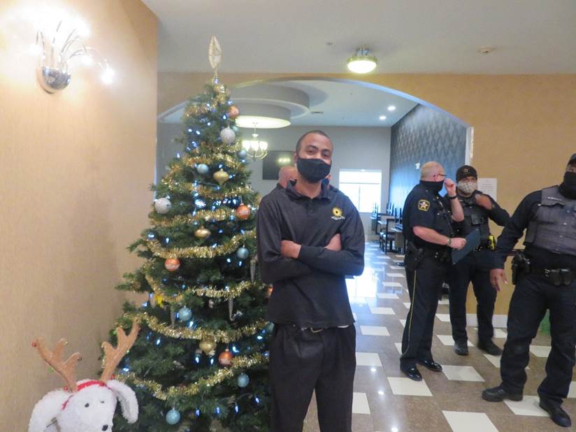 With two life-saving interventions under his belt, DeSoto LaQuinta Hotel Front Desk Supervisor Davion Dawson stands tall, even when surrounded by some of DeSoto’s most unflappable first responders.