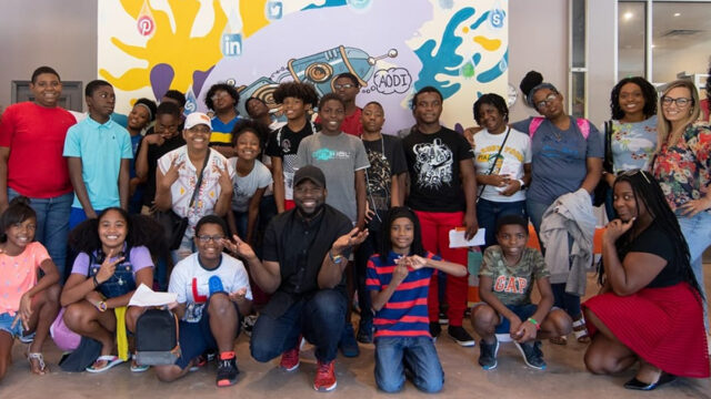 Mahiri Takai (c) and participants at AODI Youth programming