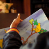 Jonathan's Place reads a book