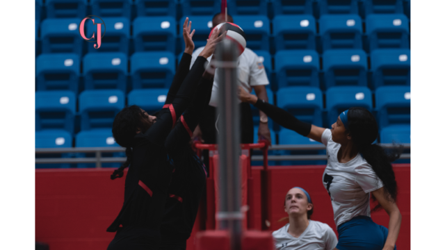 McKenna Linton, number 14 on Duncanville team and her teammates blocked the ball. Duncanville wins 3-1 against Everman Bulldogs Tuesday night.