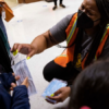 Principal Shanieka Christmas-McDonald hands out masks