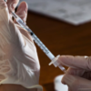 A Medical Professional prepares Pfizer vaccine