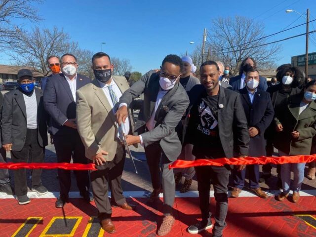 Kirk Myers and other dignitaries cut ribbon during ceremony