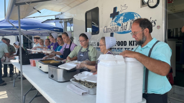 Members of Christian Aid Ministries preparing meals