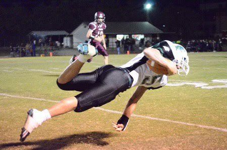 Christopher Hill playing football