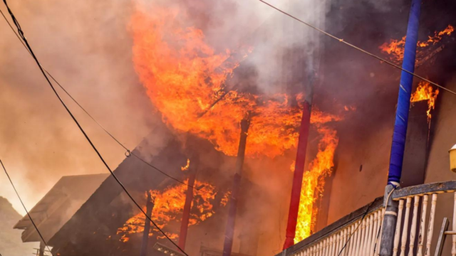 A Colonial-era building on fire in Cap-Haitien