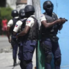 Haitian police officers standing on guard