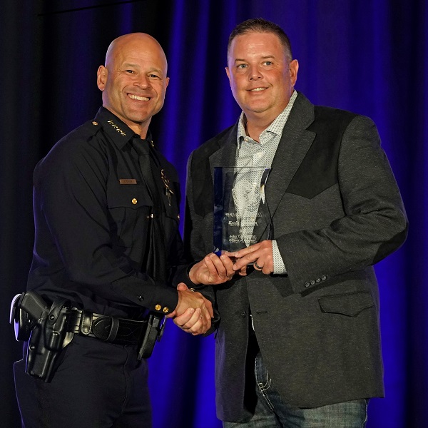 Dallas Police Chief Eddie Garcia and Police Officer of the Year Kevin Gladden