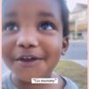 TODDLER CHEERING HIS MOTHER ON