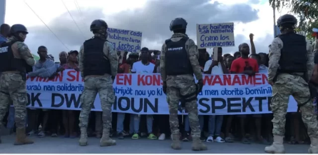 Protesters standing