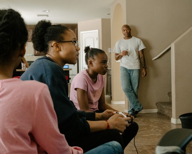 Stephan Muhammad watches his daughters at their home in Phoenix, Arizona.