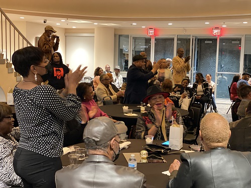 Audience members clapping after Rob Holbert peformance at Music Under the Dome Feb. 23-2023