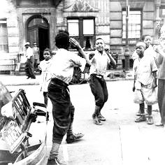 Youths fighting with hands on city street. Photo: Pinterest