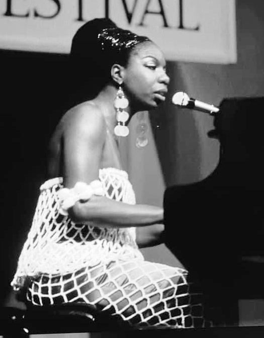 Nina Simone at the piano.