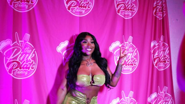 Erica Banks smiles for the cameras at the Pink Plate Tasting