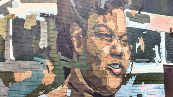 arah Mae Flemming mural on the side of a building in Columbia