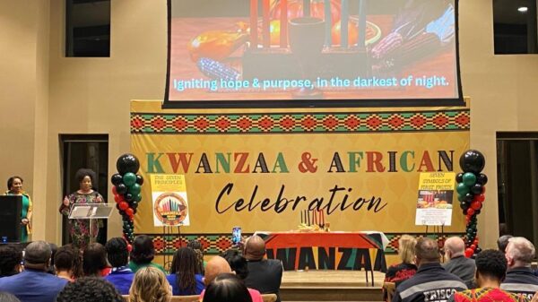Tuere Davis Williams performs engaging spoken word at Kwanzaa _ African Celebration in Frisco Dec. 19, 2023 - 1