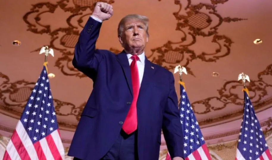 Former President Donald Trump gestures after announcing he is running for president for the third time as he speaks at Mar-a-Lago in Palm Beach, Fla., Nov. 15, 2022. (AP Photo/Andrew Harnik)