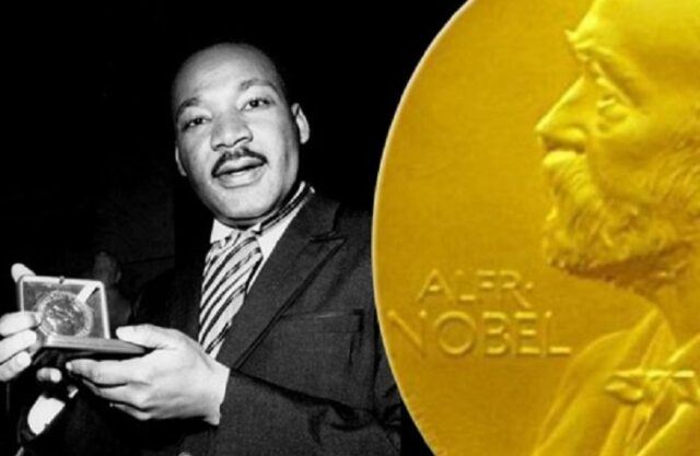 American Human Rights Council Image MLK Holding Nobel Peace Prize