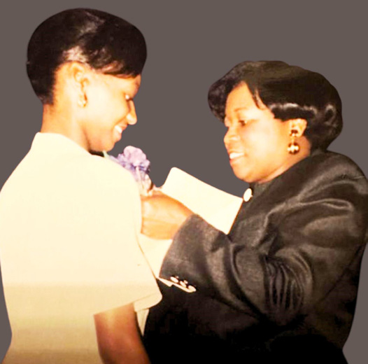 Mother pinning daughter in 1999.