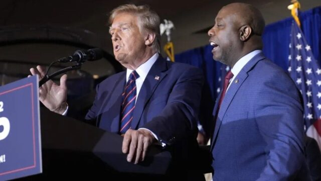 Donald Trump speaks as Sen. Tim Scott