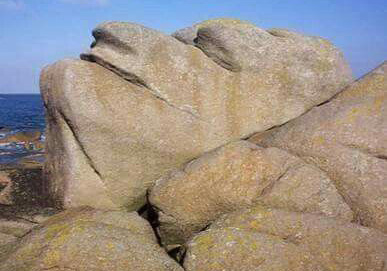 Rock formation in shape of human.