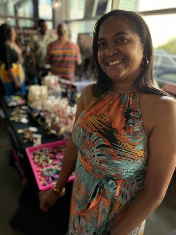 Shadran Franklin of Wrist Vibes Designs at table during Pop-Up Market at Juneteenth Fashion Show in Plano, Texas June 15, 2024 