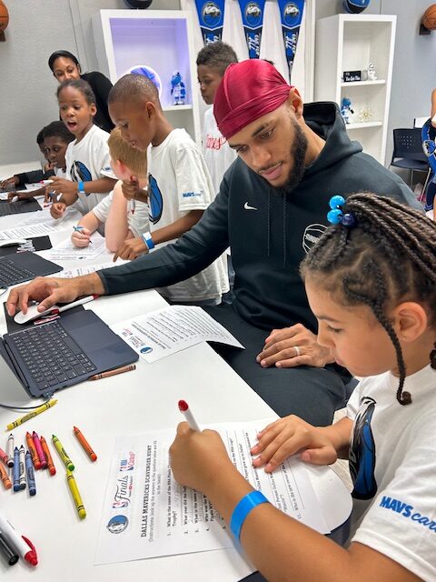 Daniel Gafford with youth in their new STEM Lab