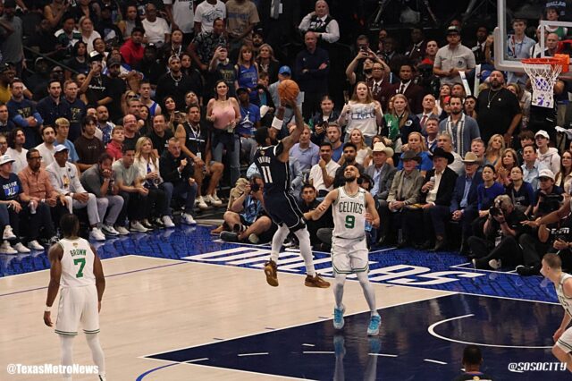 Kyrie Irving Shoots Above Celtics' Derrick White