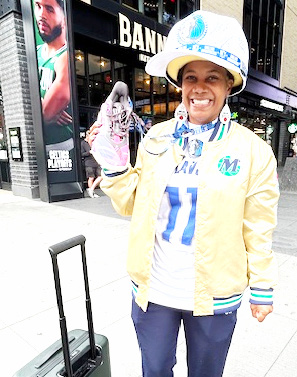 Minnie’s Pantry Founder Cheryl “Action” Jackson” and Mavs Super Fan, showing her team spirit in Boston for Games 1 and 2 of NBA Finals.