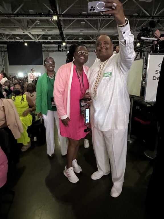 Roland Martin takes photos with AKAs before the VP speaks 