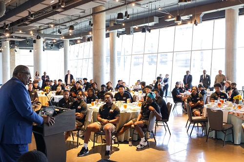 Sen. Royce West speaks to HBCU baseball players during the Suit Up Experience luncheon