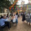 Attendees enjoying outdoors during HCDFW Rosie Casals Lifetime Achievement Celebration at residence in Dallas