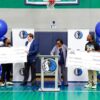 For Oak Cliff Acceps $100,000 check presentations from Dallas Mavericks