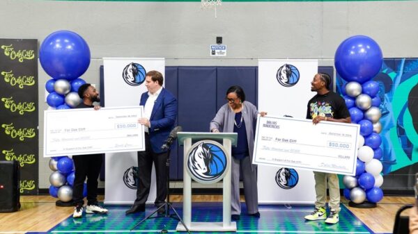 For Oak Cliff Acceps $100,000 check presentations from Dallas Mavericks