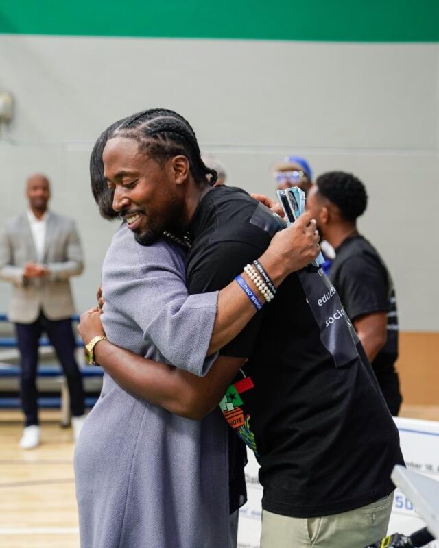 For Oak Cliff Founder Taylor Toynes and Mavs CEO Cynt Marshall Hug After Presentation