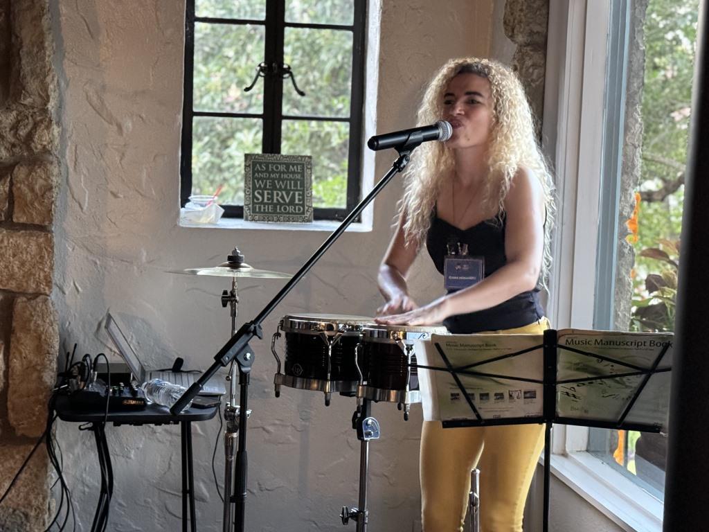 Musician providing entertainment during HCDFW Rosie Casals Lifetime Achievement Celebration at residence in Dallas