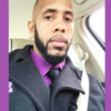 Officer Burks seated in his car.