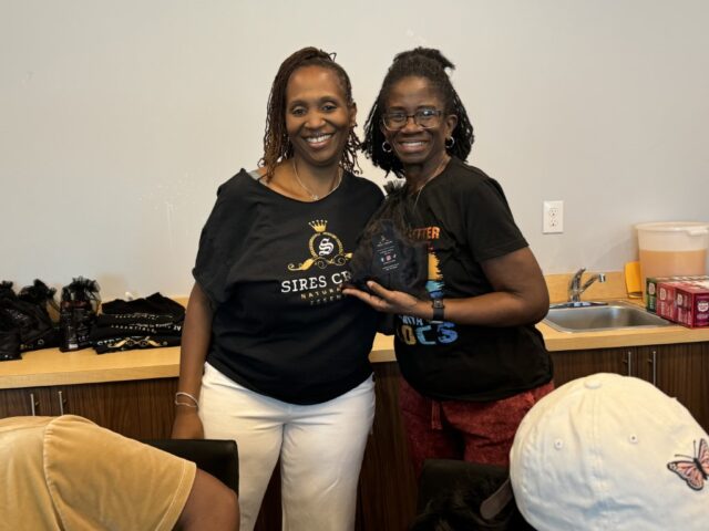 Sires Crown Founder_CEO LaShawn Johnson with door prize winner at launch event Oct. 26, 2024 in Plano, TX 