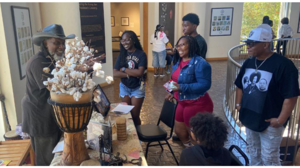 Glover with cotton exhibit at African American Museum during Grambling-Prairie View game (1)