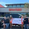 DFW Hooters Raises Money for Guns and Hoses Foundation