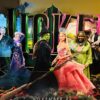 Eva D. Coleman at cutout display during Wicked movie screening at AMC Northpark on Nov. 17, 2024