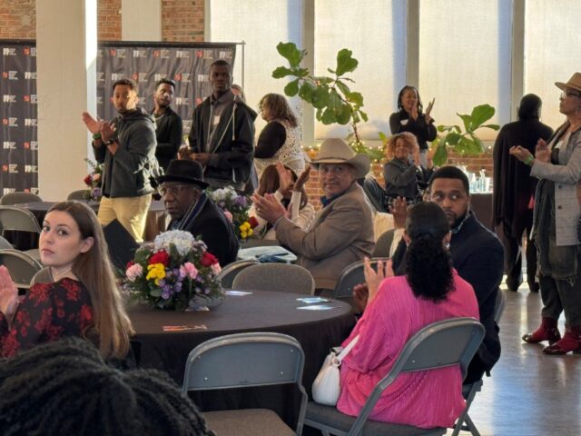 3-Audience claps as honorary hosts are introduced during Denton Black Film Festival Media & Film Mixer on Dec. 8, 2024 in Denton, TX
